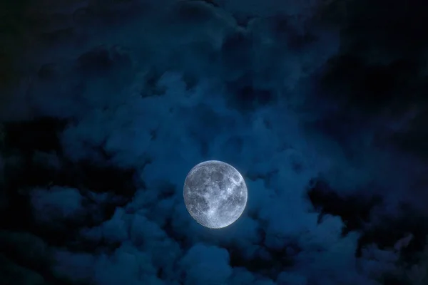 Bright Moon Earth satellite on the night sky — Stock Photo, Image