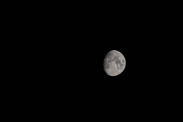 Bright Moon Earth satellite on the night sky