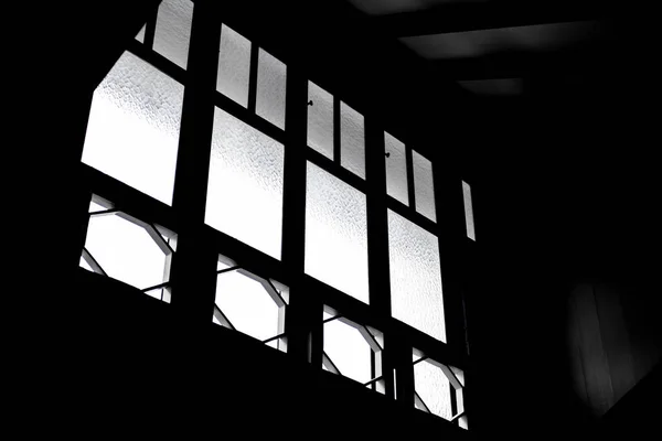 Silhouette from ancient windows — Stockfoto