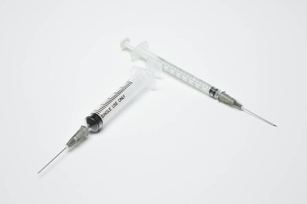 Syringe on a  white background