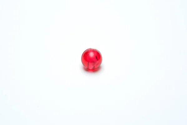 Red beads on a  white background — Stock Photo, Image