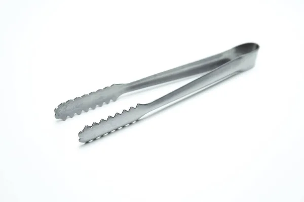 Beyaz arka plan üzerinde buz Tong