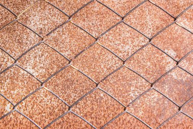 Çelik plaka paslı arka planda ızgara pas.