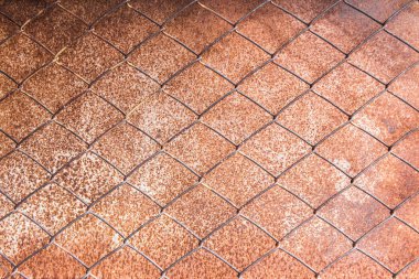 Çelik plaka paslı arka planda ızgara pas.