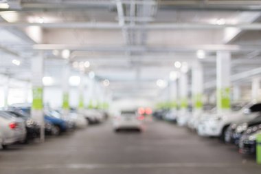 Blurred of Many cars in parking garage