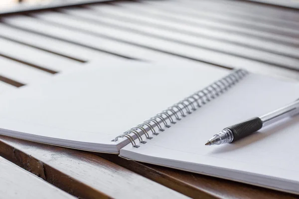 Selective Focus Pen Notebook Wooden Table Warm Light Copy Space — Stock Photo, Image