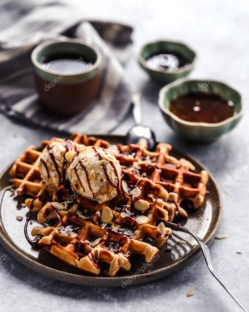 Belgium waffles with maple syrup and tiramisu ice cream