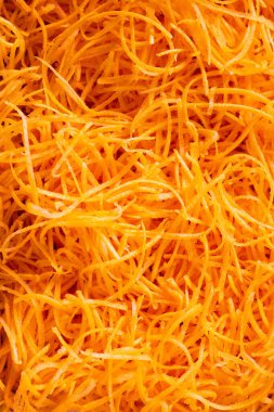 Parlak turuncu rendelenmiş havuç arka planı, Top view. Malzeme. Sebze. Kapatın. Sağlıklı. Doku