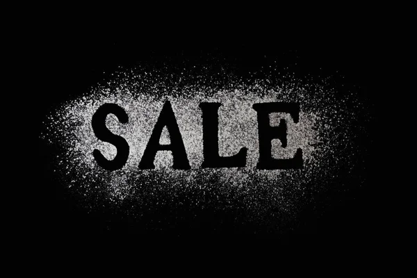 Letters of word sale made with sieved flour on black table background, Concept for preparation for baking, horizontal shot, Lettering — Stock Photo, Image