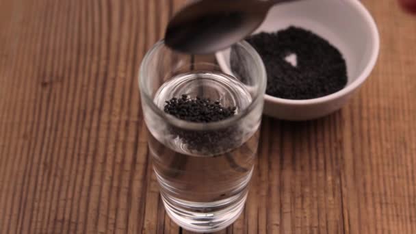 Raw Basil Seeds Added Tea Spoon Glass Water Mix Old — Stock Video
