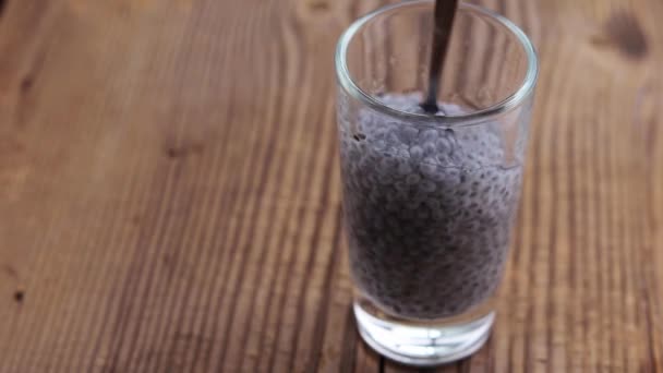 Raw Soaked Basil Seeds Glass Water Mixing Tea Spoon Old — Stock Video