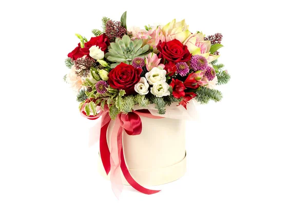 Floral fresh arrangement of bright flowers in a hat box copy space white background — Stock Photo, Image