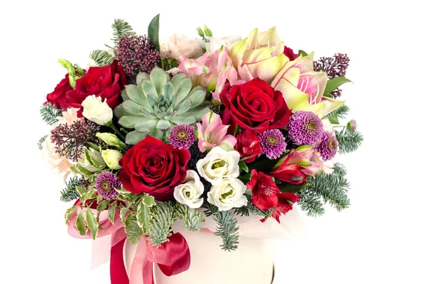Floral fresh arrangement of bright flowers in a hat box copy space white background — Stock Photo, Image