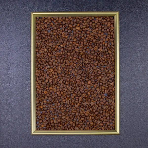 Photo frame with coffee beans on a gray background, flat lay, top view, copy space. — Stock Photo, Image