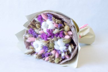 a bouquet of dried flowers of cereals lavender on a white background clipart