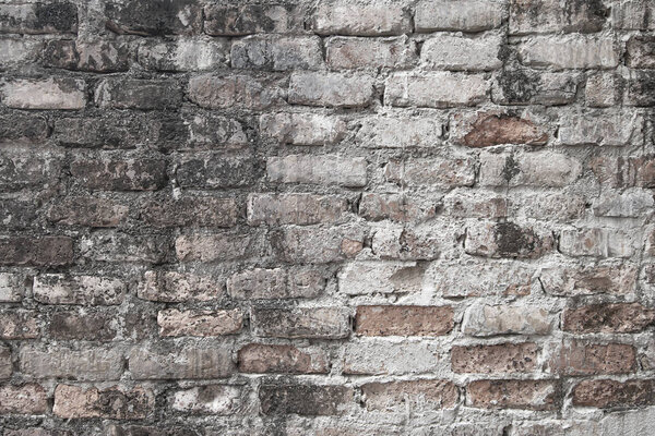 Old antique brick wall background.