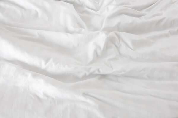 Close up of bedding White sheets with copy space.