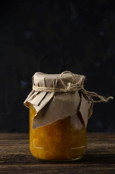 Tangarine marmalade jam in glass jar. Christmas winter mood. Homemade citrus cinnamon — Stock Photo, Image