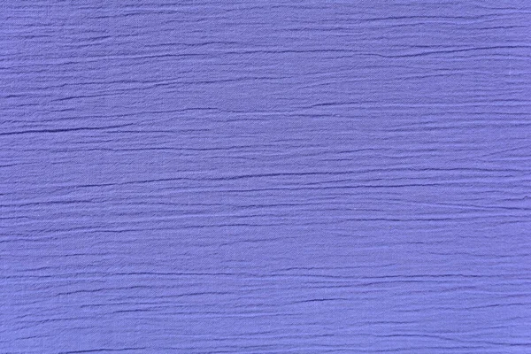 background of crumpled purple fabric