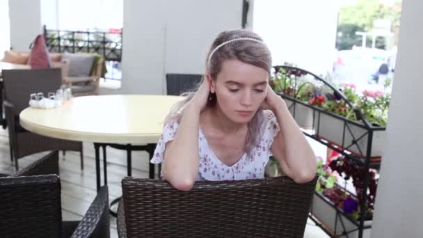 Young Cute Caucasian Girl Summer Dress Sitting Wicker Chair Cafe — Stock Video