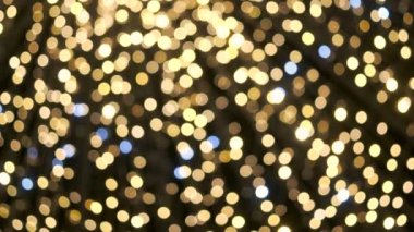 Noelde ya da yeni yıl gecesinde odaklı olmayan renk ışıkları, yumuşak soyut arkaplan