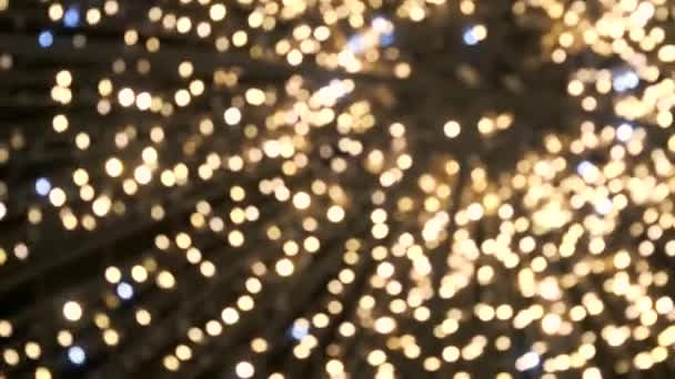 Lumières de couleur déconcentrées à Noël ou nouvelle nuit de l'année, fond abstrait doux — Video