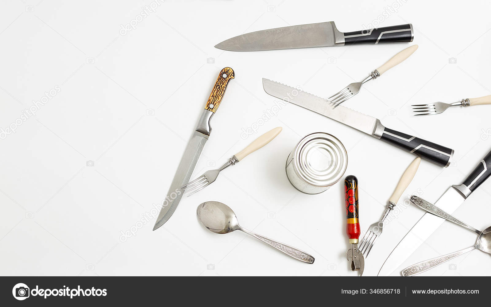 https://st3.depositphotos.com/26629778/34685/i/1600/depositphotos_346856718-stock-photo-kitchen-utensils-opener-forks-sharp.jpg