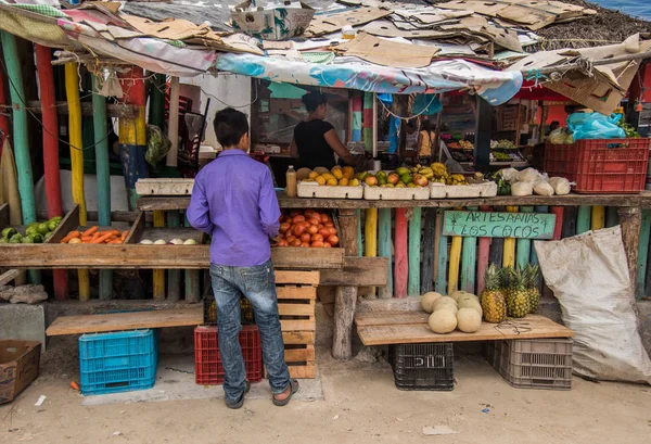 Holbox, Mexico - june 01,2017: Local market in Mexico. choosing some fruits and vegetables.
