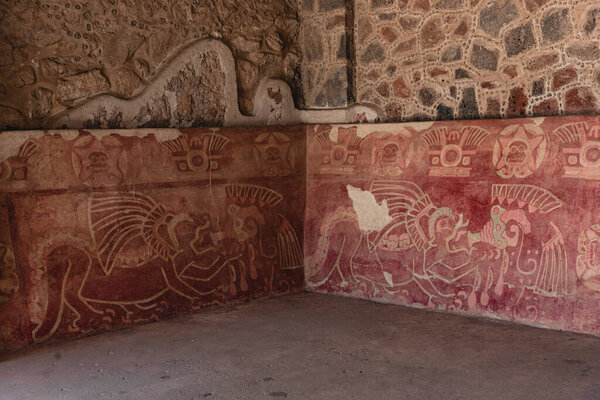 Teotihuacan, Mexico , In the Palace of the Jaguars there are murals depicting plumed felines holding conch shells and images of a goggled deity. illustrative