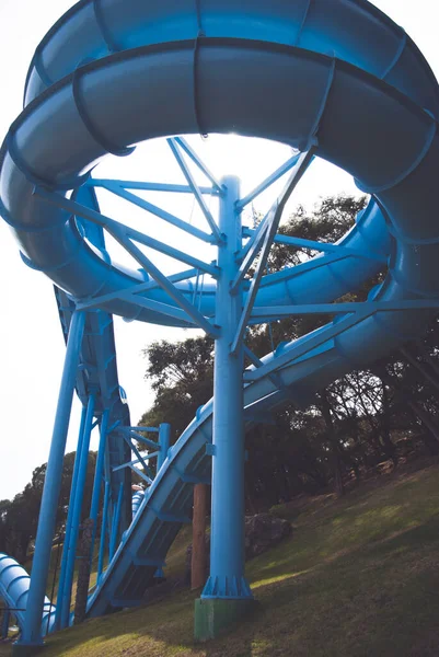 A water slide is a type of slide designed for warm-weather or indoor recreational use at water parks.\