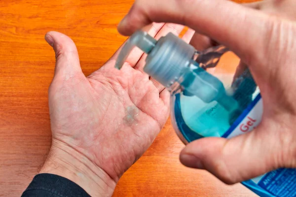 Cleaning hands with gel to avoid viruses such as coronavirus