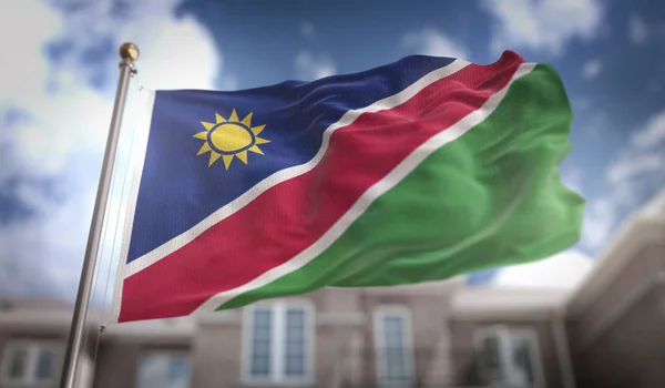 Namibia Flagge 3D-Rendering auf blauem Himmel Gebäude Hintergrund — Stockfoto