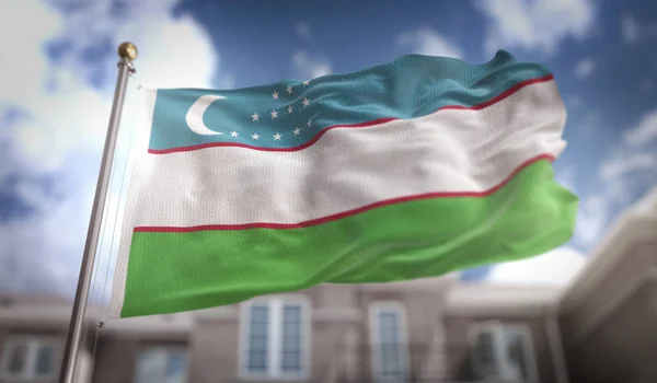 Uzbekistán příznak 3d vykreslování na pozadí modré oblohy budovy — Stock fotografie