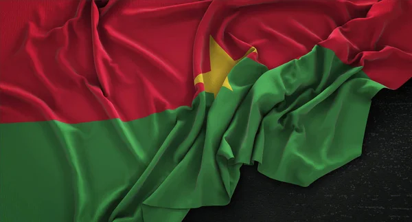 Прапор Буркіна Фасо зморшкуватою на темному тло 3d візуалізації — стокове фото