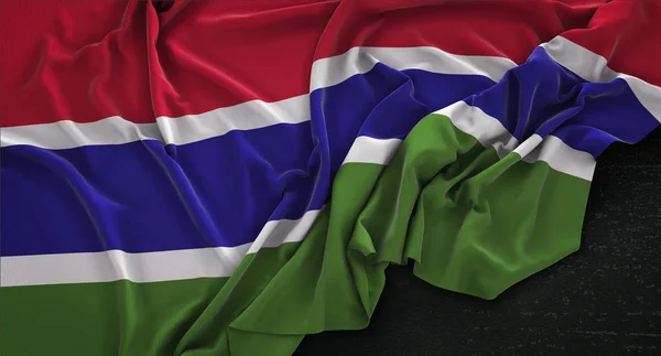 Die Gambia-Flagge zerknittert auf dunklem Hintergrund 3D-Rendering — Stockfoto