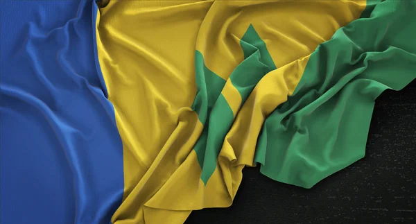 Saint vincent und die Grenadinen-Fahne auf dunklem Hintergrund zerknittert — Stockfoto