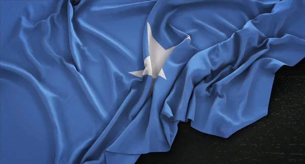 索马里国旗皱在黑暗背景 3d 渲染 — 图库照片