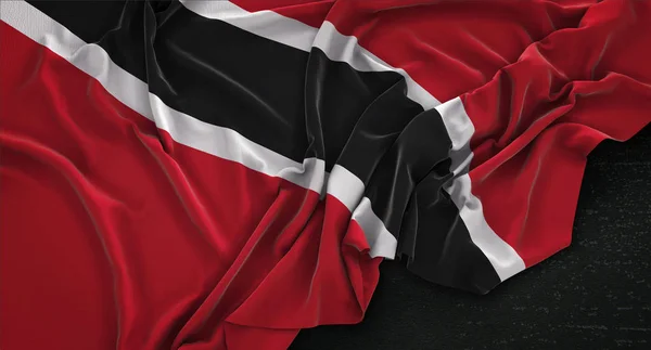 Trinidad und Tobago Flagge zerknittert auf dunklem Hintergrund 3D-Rendering — Stockfoto