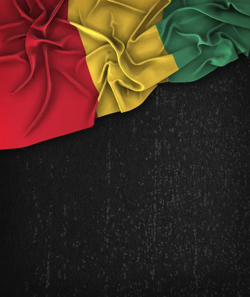 Guinea-Flagge Vintage auf einer schwarzen Grunge-Tafel mit Platz für — Stockfoto