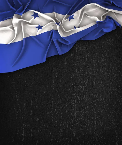 Винтаж флага Гондураса на гранжевой черной доске с космическим флагом Fo — стоковое фото