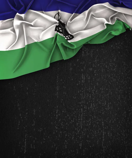 Lesotho flag vintage auf einer schwarzen Grunge-Tafel mit Platz für — Stockfoto