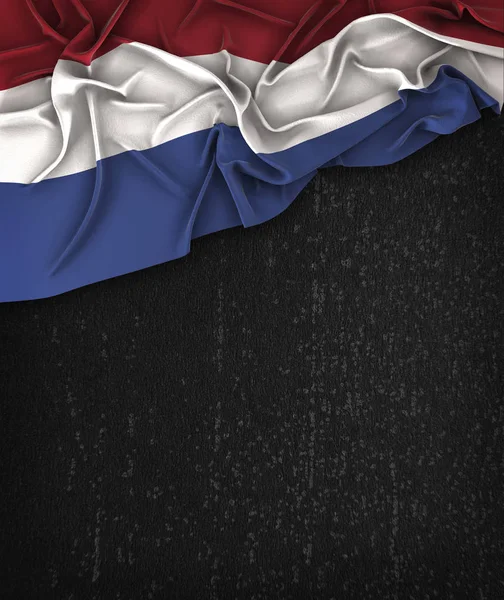 Bandeira da Holanda Vintage em um papelão preto grunge com espaço — Fotografia de Stock