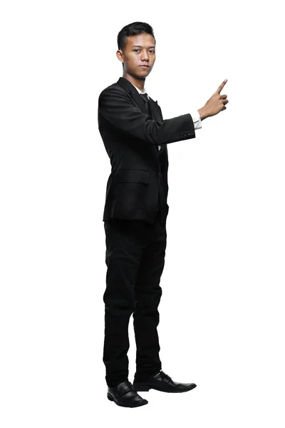 Full Body Young Asian Businessman Pointing Something Isolated Wh — Stok Foto