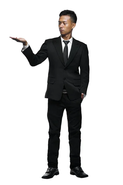 Full Body Young Asian Businessman Presenting Something Isolated — Stok Foto
