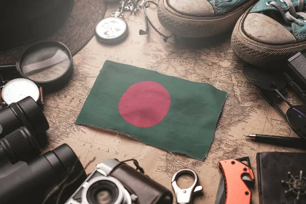 Bangladesh Flag Between Traveler's Accessories on Old Vintage Ma — Stock Photo, Image