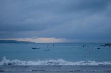 Bali adasındaki Jimbaran 'da akşam kumsalı