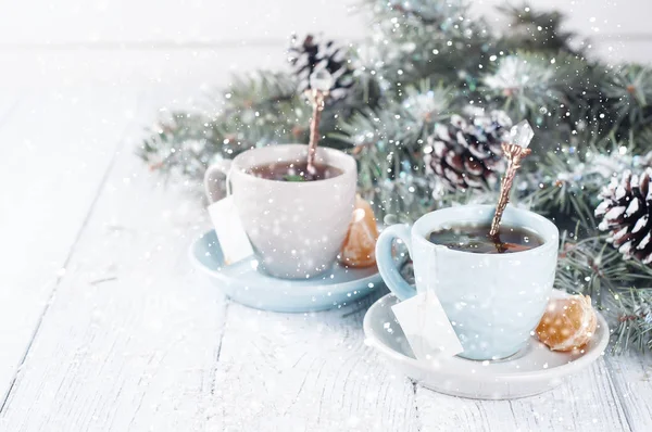 Two tea cups with teabag and xmas tree — Stock Photo, Image