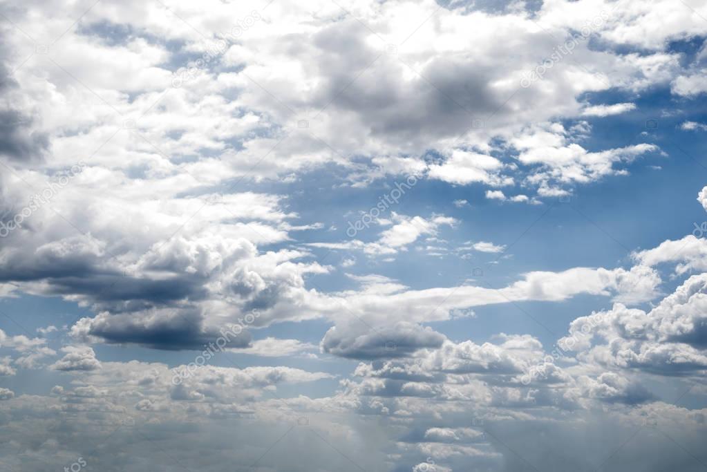 White clouds running over sky