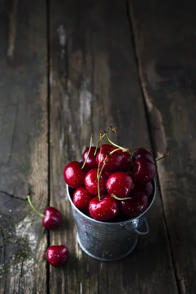 Ripe cherry in a vintage bowl — Stock Photo, Image