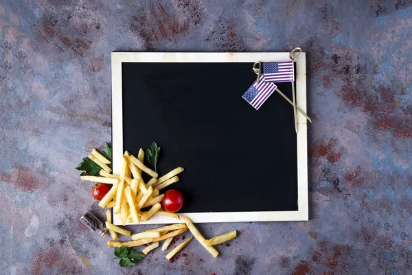 Fresh fries on chalkboard — Stock Photo, Image